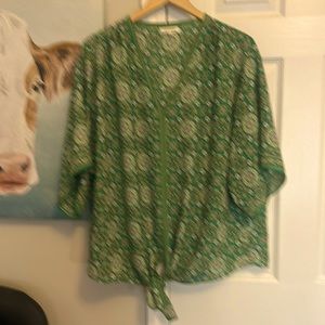 Summer blouse - vibrant green with pattern and it ties at the bottom in front.